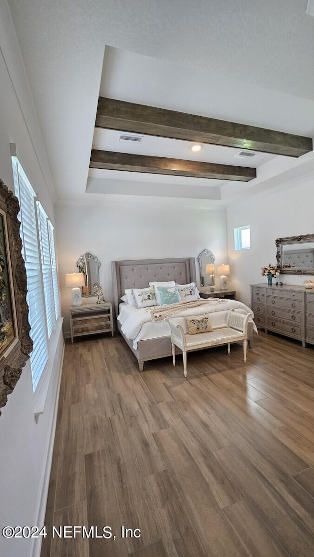 bedroom with hardwood / wood-style flooring