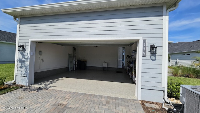 garage with central AC unit