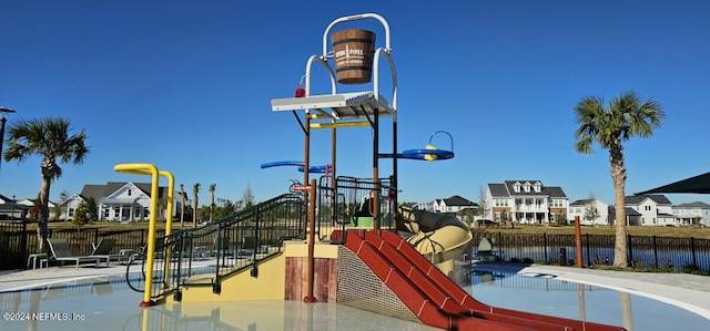 view of play area featuring a water view