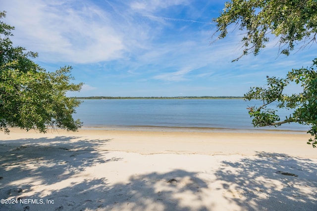 property view of water featuring a beach view