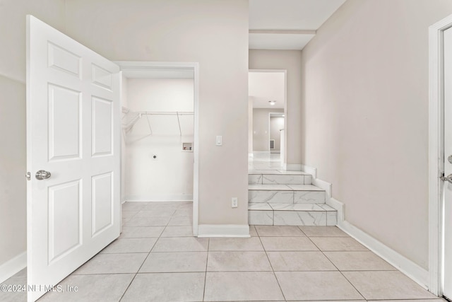 interior space featuring light tile patterned floors