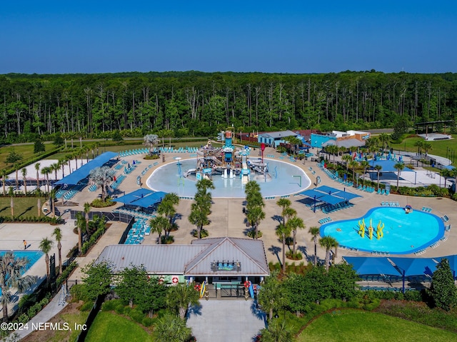 aerial view with a wooded view