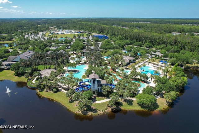 drone / aerial view with a view of trees