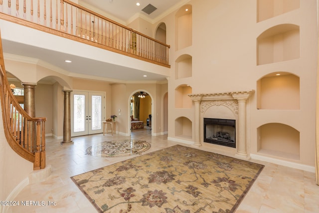 living room with baseboards, stairs, visible vents, and ornamental molding