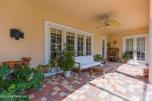 view of patio featuring a ceiling fan and french doors