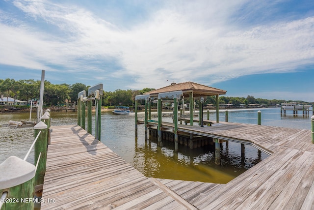 view of dock with a water view