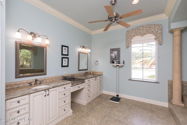 full bath featuring double vanity, ornamental molding, and a sink