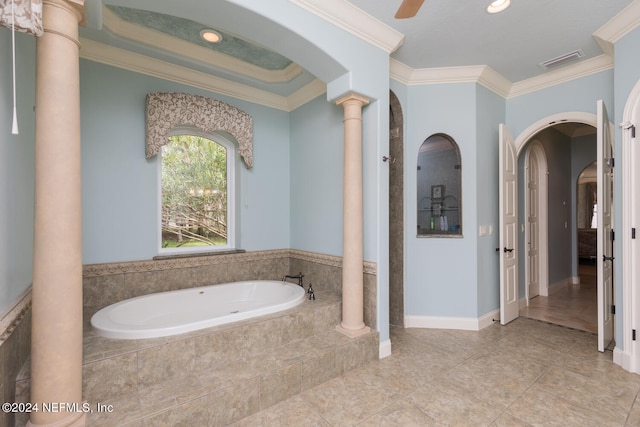 bathroom featuring decorative columns, visible vents, ceiling fan, a garden tub, and crown molding