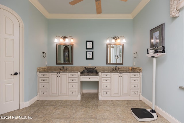 full bathroom with ceiling fan, crown molding, baseboards, and double vanity