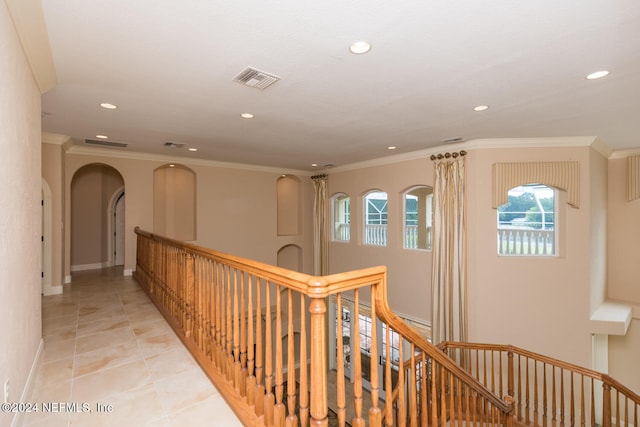 hall with light tile patterned floors, visible vents, crown molding, an upstairs landing, and recessed lighting