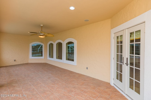 exterior space with ceiling fan and french doors