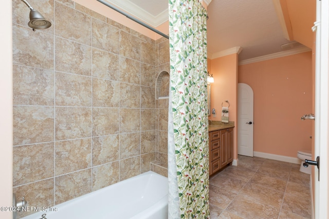 bathroom with crown molding, toilet, shower / bath combo, vanity, and baseboards