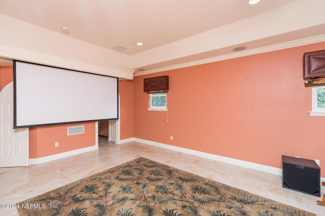 cinema room with light tile patterned floors, baseboards, crown molding, and recessed lighting