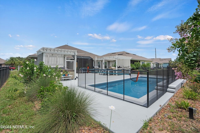 view of pool with a patio area and a pergola