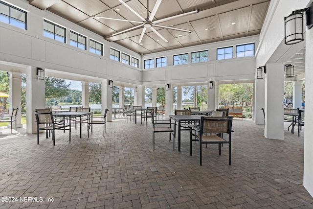 sunroom / solarium featuring wood ceiling