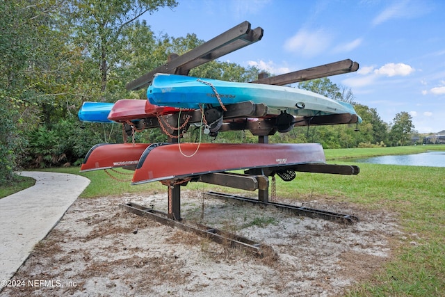 view of playground featuring a water view