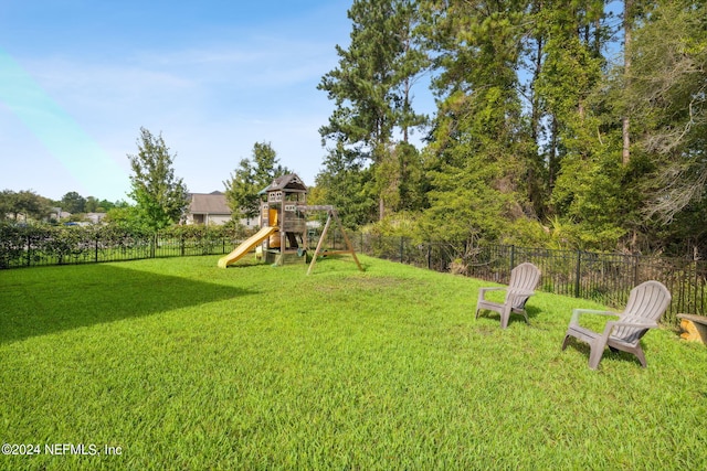 view of yard featuring a playground