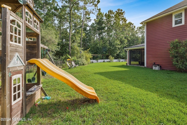 view of yard with a playground