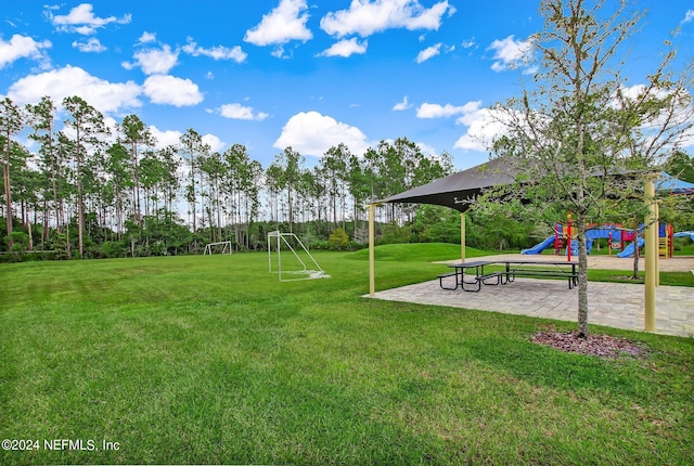 view of yard with a playground