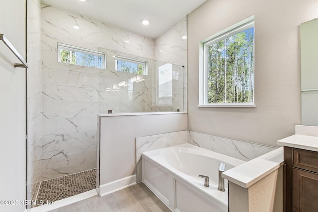 bathroom featuring a marble finish shower, baseboards, recessed lighting, a bath, and vanity