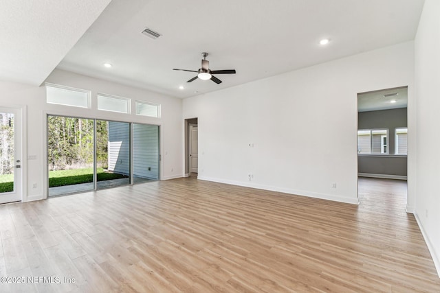 spare room featuring visible vents, recessed lighting, light wood-style floors, baseboards, and ceiling fan