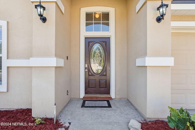 entrance to property with a garage