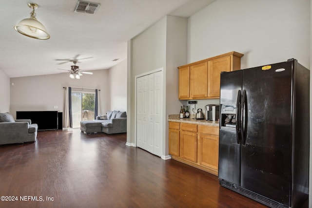 kitchen with a textured ceiling, a high ceiling, dark wood-type flooring, ceiling fan, and black refrigerator with ice dispenser