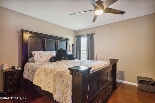 bedroom featuring dark wood-type flooring and ceiling fan