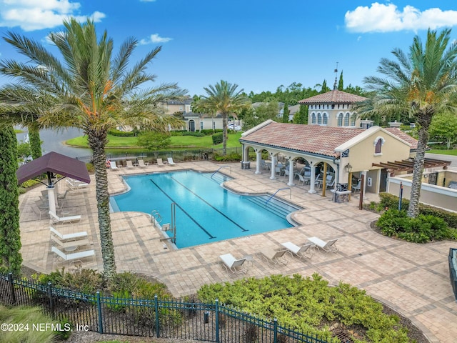 view of pool featuring a pergola and a patio area