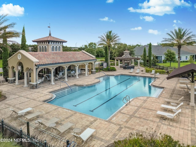 view of pool featuring a gazebo and a patio area