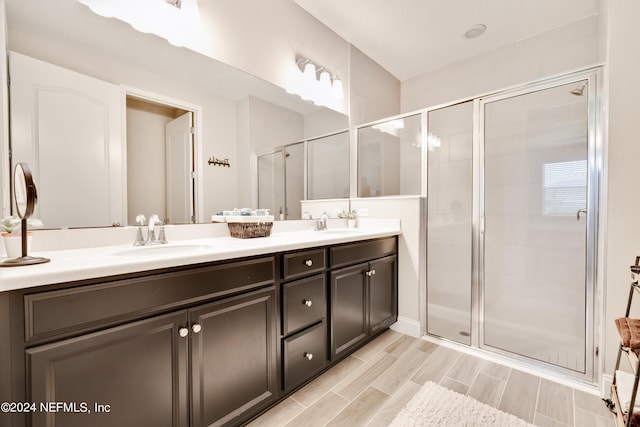 bathroom featuring vanity and walk in shower