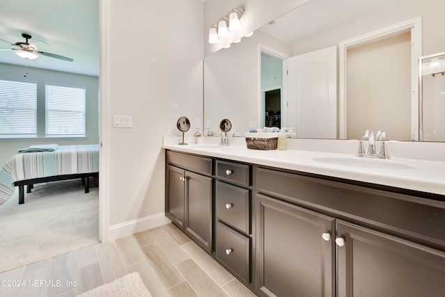 bathroom featuring vanity and ceiling fan