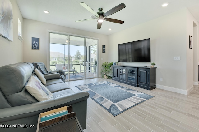 living room featuring ceiling fan