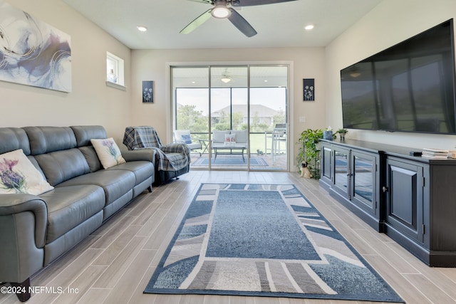 living room featuring ceiling fan