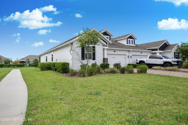 view of property exterior featuring a garage and a lawn