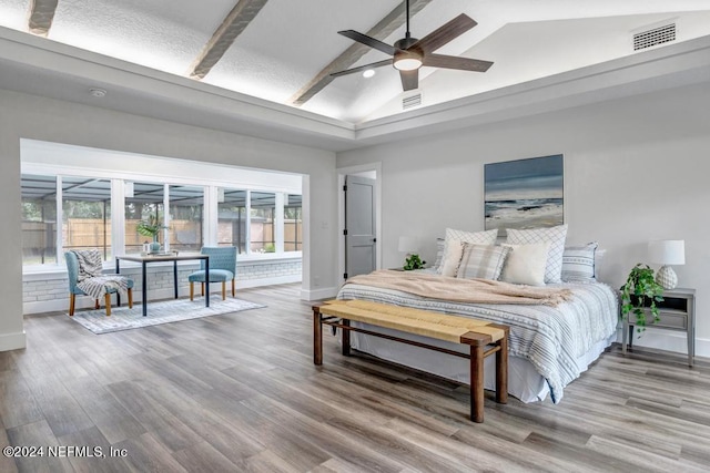 bedroom featuring high vaulted ceiling, wood-type flooring, and ceiling fan