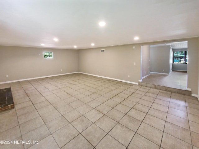 spare room with light tile patterned floors