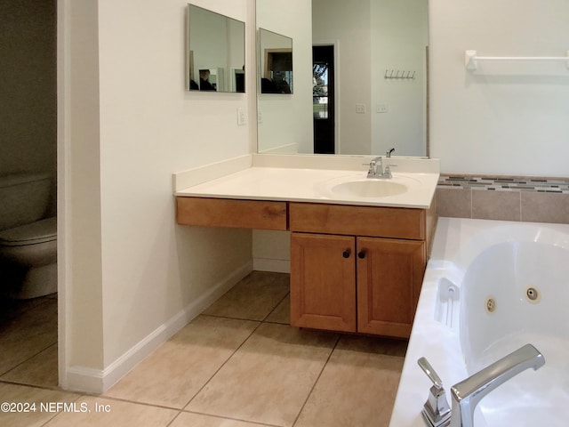 bathroom with tile patterned floors, toilet, and vanity