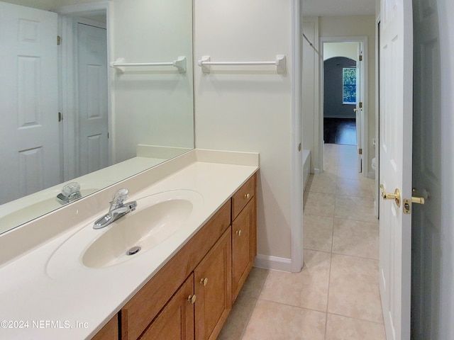 bathroom with vanity and tile patterned floors