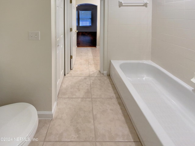 bathroom with tile patterned floors and toilet