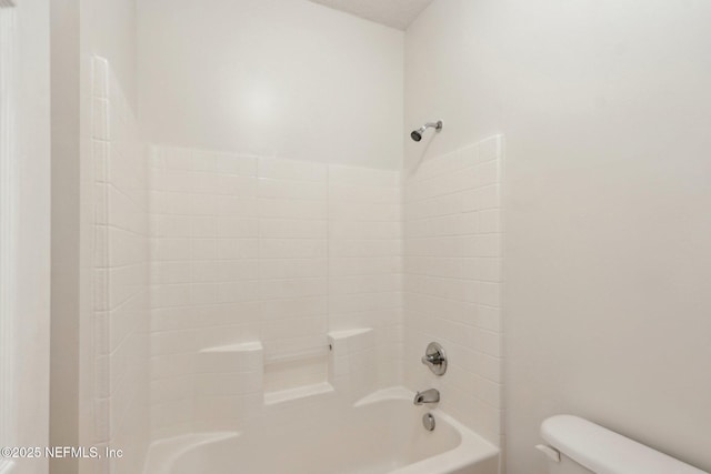 full bathroom featuring shower / bath combination and toilet