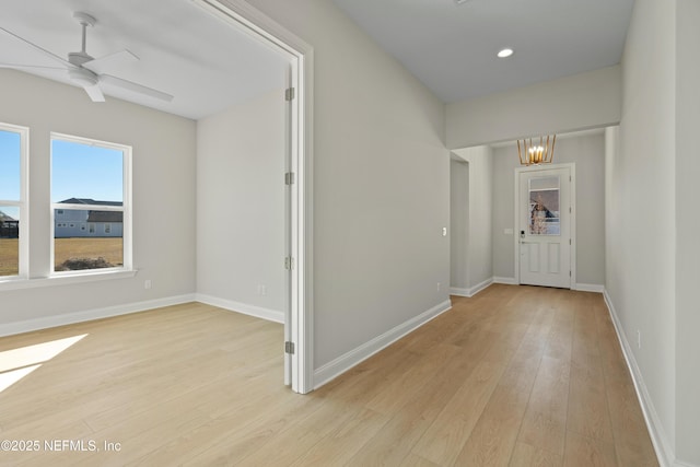 interior space featuring light hardwood / wood-style flooring and a chandelier