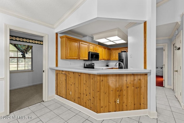 kitchen featuring stainless steel refrigerator with ice dispenser, light tile patterned flooring, crown molding, range, and kitchen peninsula