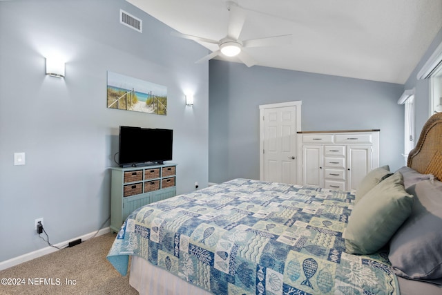 bedroom featuring carpet, vaulted ceiling, and ceiling fan