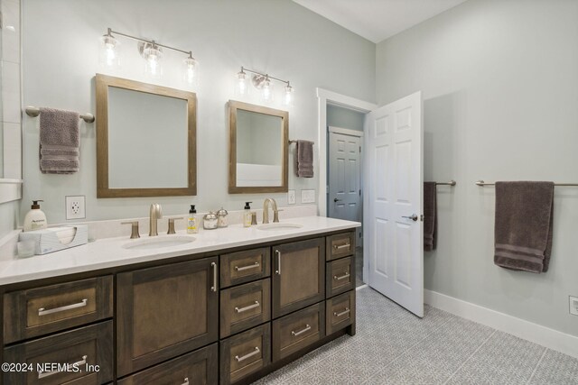 bathroom with vanity and tile patterned floors