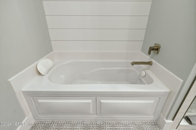 bathroom with a washtub