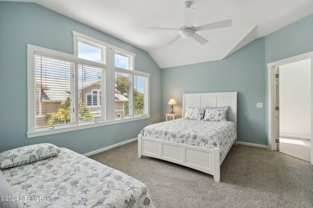 bedroom featuring carpet flooring, ceiling fan, and lofted ceiling