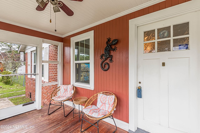 exterior space with ceiling fan