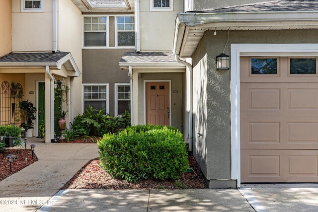 entrance to property with a garage