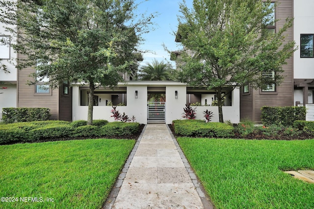 view of front of house with a front yard